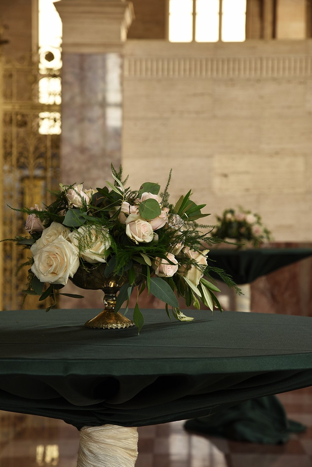 Organic, free-flowing floral arrangements | Vintage Garden Wedding at the Historic Alfred I DuPont Building in Miami, FL