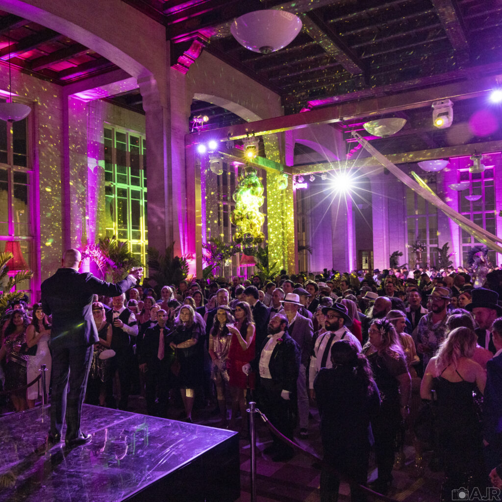 Crowd enjoying immersive entertainment at The Great Gatsby Party Miami