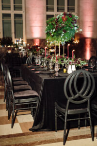 Black and maroon wedding cake at a September wedding at The Historic Alfred I. duPont Building.