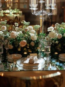 Elegant table setting at modern garden wedding reception