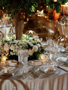 Elegant table setting at modern garden wedding reception