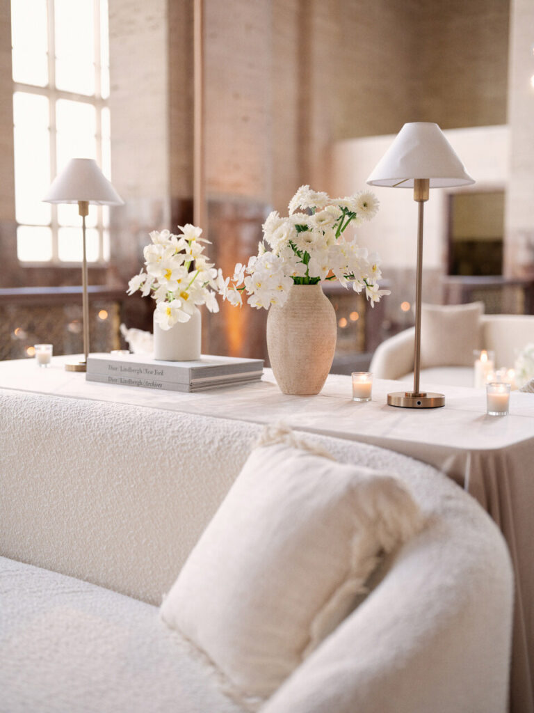 Cloud Dancer event design lounge setup with white florals and soft textures