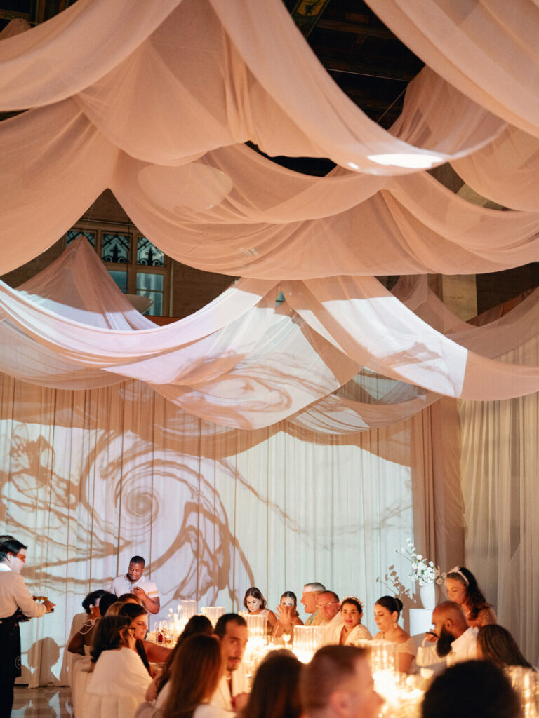 Cloud Dancer event design lounge setup with white florals and soft textures