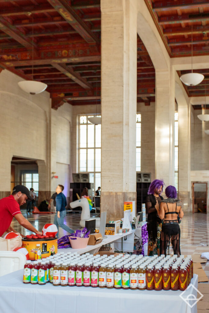 Brand activation and event partner setup inside a Miami event space