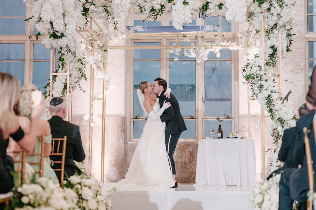 Couple celebrating their wedding at The Historic Alfred I. duPont Building Miami