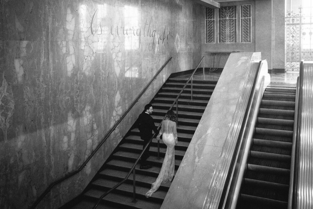 Backless bridal gown photographed inside The Historic Alfred I. duPont Building